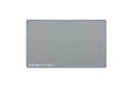 A rectangular ash gray beauty mat with rounded corners and the text 'THE BEAUTY MAT' printed in white at the bottom left, shown on a plain white background.