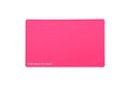 A hot pink rectangular beauty mat with rounded corners and the white text 'THE BEAUTY MAT' printed in the bottom-left corner, shown on a plain white background.